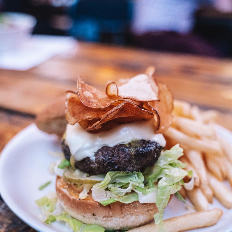 The CY Burger with bacon, cheese and fries