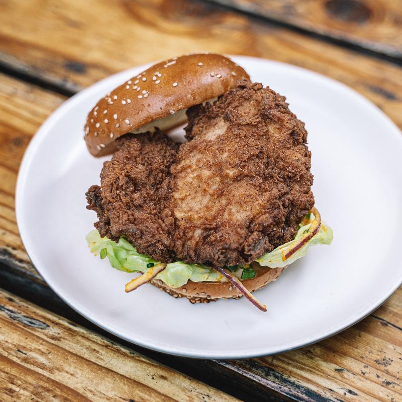 Fried chicken sandwich on a white plate