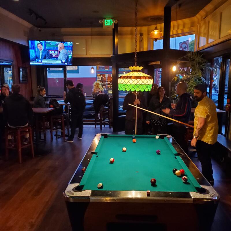 Guests playing pool