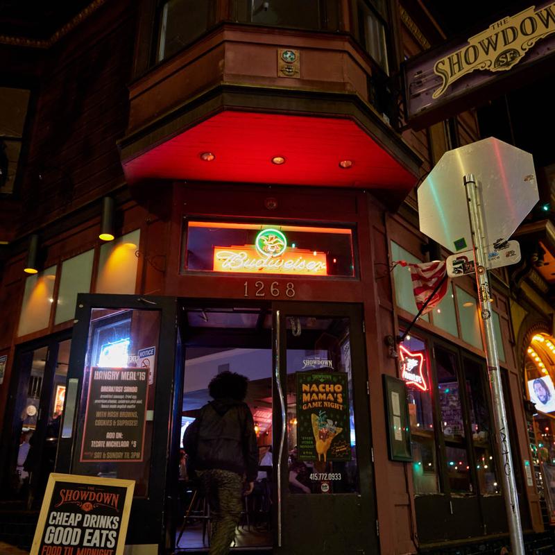 The Showdown's corner entrance at 1268 Grant Ave at night