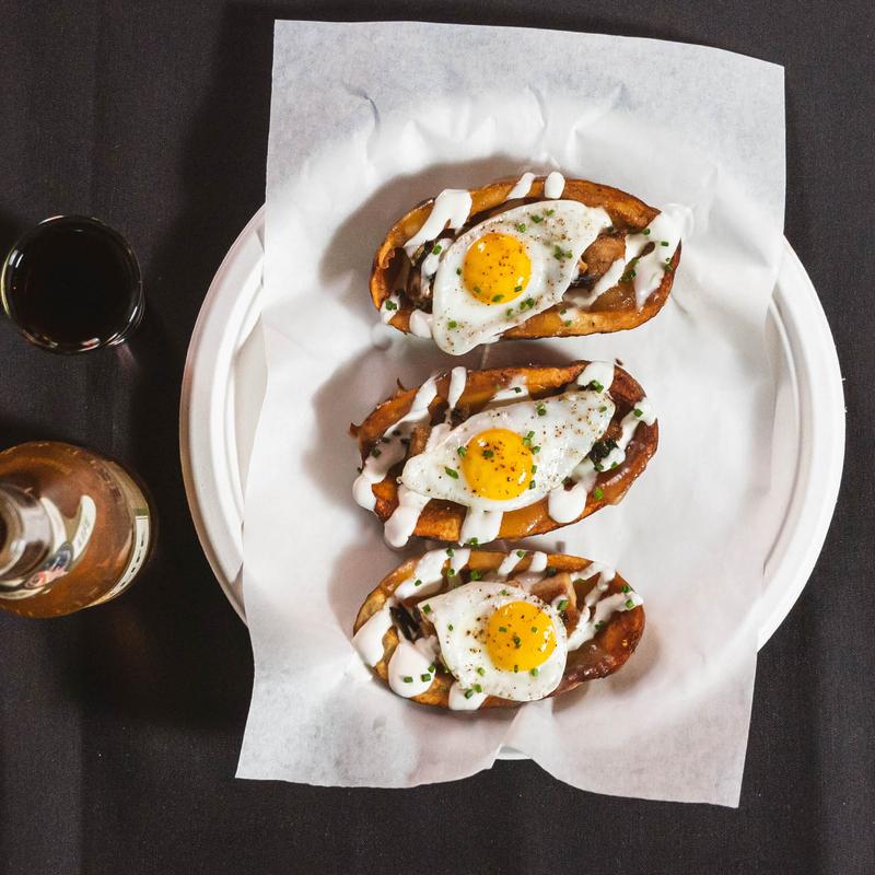 The potato skins topped with fried quail eggs